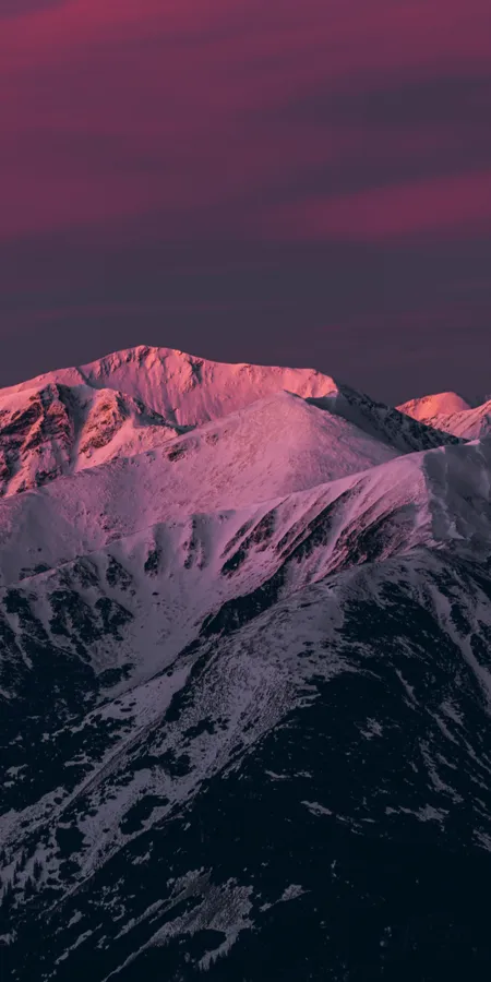 Pink Dusk Phone Wallpaper – Twilight Mountains and Snow